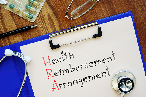 Health reimbursement arrangement HRA is shown on a conceptual business photo