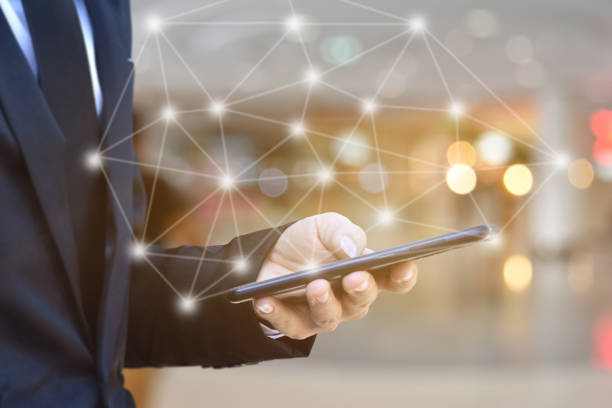 istock Close up of Businessman using smartphone with icon network. 1270623824