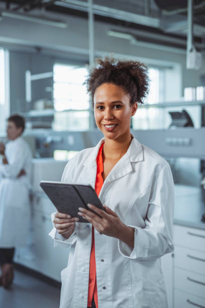 istock Young Mixed Race University Student Working in Laboratory 1270625173