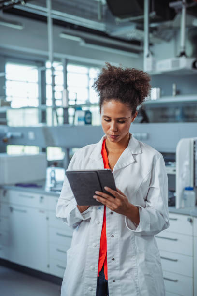 istock Young Mixed Race University Student Working in Laboratory 1270625237