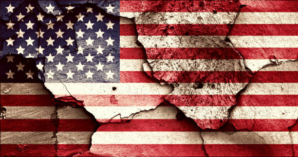 istock flag of USA painted on cracked wall 1270628819