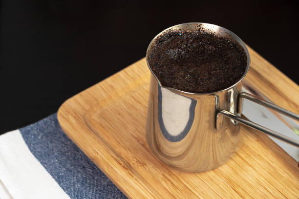 istock Brewed coffee in a metal turk on a kitchen counter 1270628855
