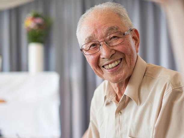 istock An old man talking animatedly at a family event 1270630203