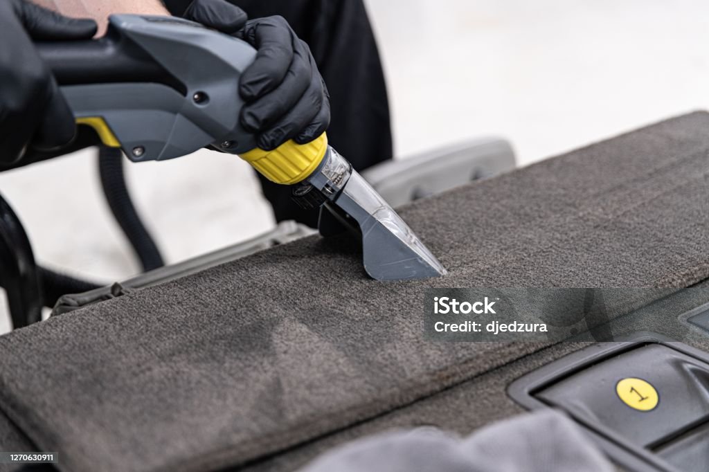 Man Car Detailing Studio Worker Washing Car Upholstery With Vacuum Washer  Stock Photo - Download Image Now - iStock