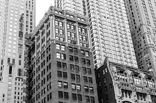 New York City, USA - October 7, 2019: Old and modern buildings in the financial district of Manhattan.