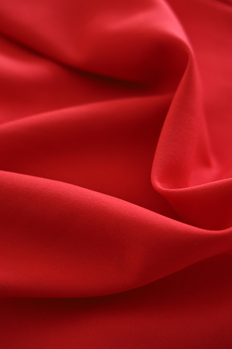 Shiny red satin background texture