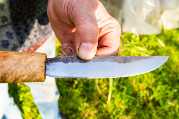 istock hand forged steel knife with wooden handle 1270633883