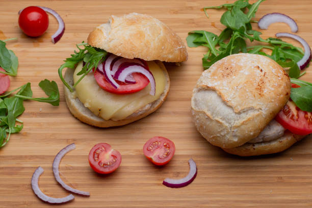 istock Homemade hamburger with beef, onion, tomato, lettuce and cheese. 1270633913