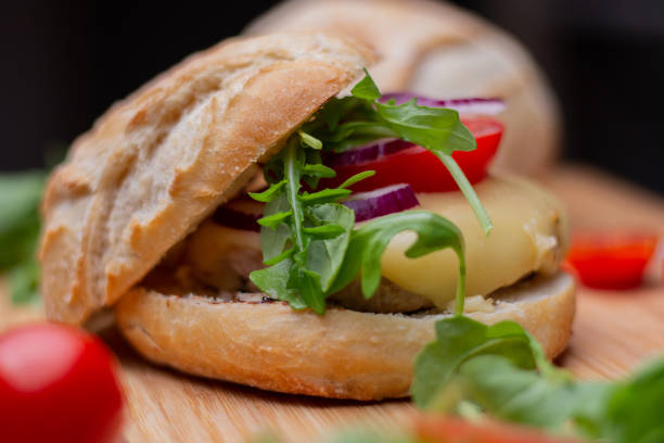istock Homemade hamburger with beef, onion, tomato, lettuce and cheese. 1270633943