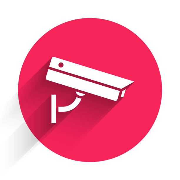 White Security camera icon isolated with long shadow. Red circle button. Vector Illustration White Security camera icon isolated with long shadow. Red circle button. Vector Illustration surveillance camera sign stock illustrations