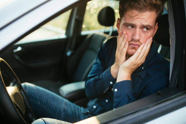 istock Desperate man in a car 1270642753
