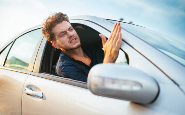 istock Handsome young adult can't hold his road rage 1270642796