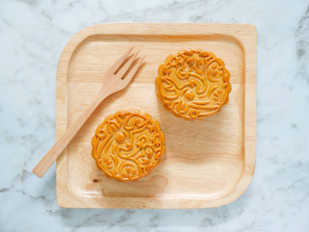 istock Mooncakes on a wooden plate 1270642815