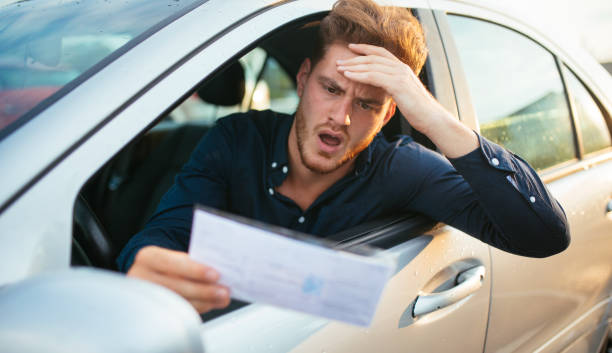 istock Handsome young man upset over getting the parking ticket 1270642872