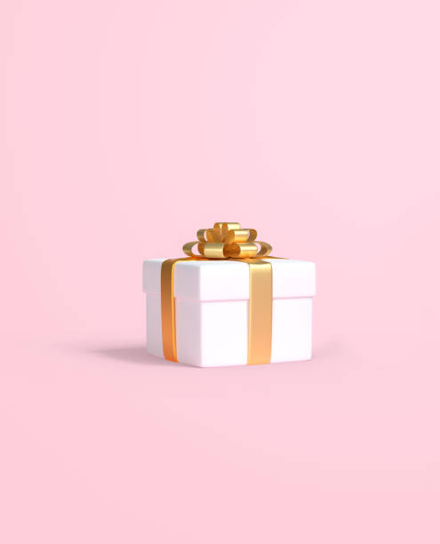 istock Gift box with gold ribbon on pastel pink background for copy space 1270645700