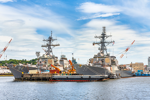 Different size navy ships in a military base outside Norfolk (West Virginia).