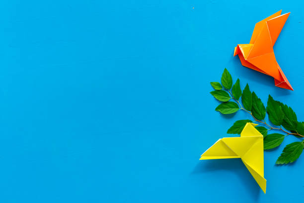 istock Paper pigeons in origami technique. DIY creativity. View from above 1270648053