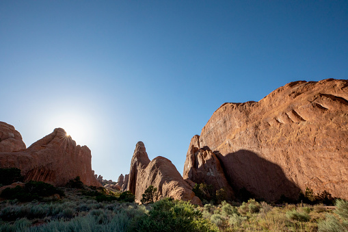 Devils garden trailhead at Arches National Park. The national park lies above an underground evaporate layer or salt bed, which is the main cause of the formation of the arches, spires, balanced rocks, sandstone fins, and eroded monoliths in the area.