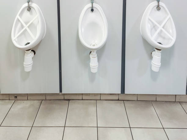 istock Socially distanced urinals in public toilet 1270654062