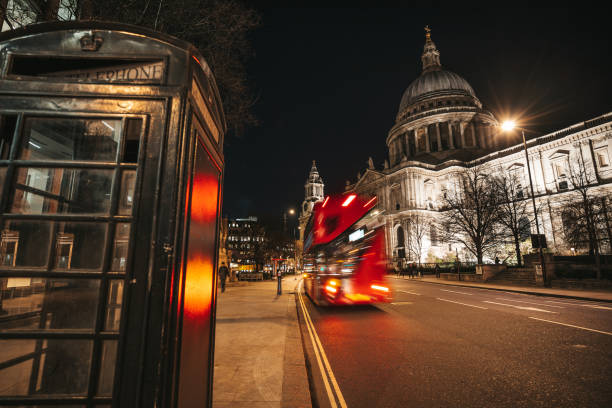 istock Traffic in London red double decker bus passing fast in St. Paul 1270654716