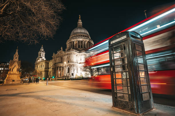 istock Traffic in London red double decker bus passing fast in St. Paul 1270655518