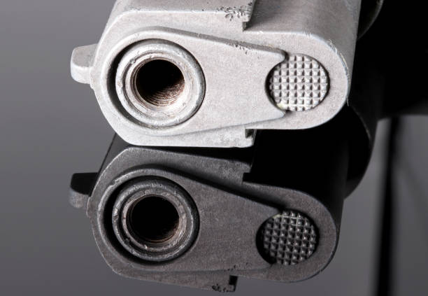 istock close up of a gun with reflection 1270656559