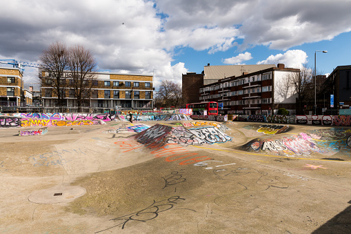 London, UK - Mar 14, 2019: The trendy Brixton neighborhood skate park late in the day,
