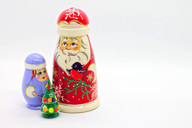 istock Russian wooden dolls - Snow-maiden and new year tree. 1270664448