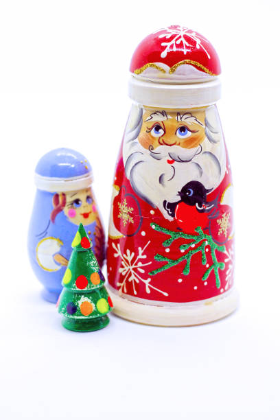 istock Russian wooden dolls - Snow-maiden and new year tree. 1270664452