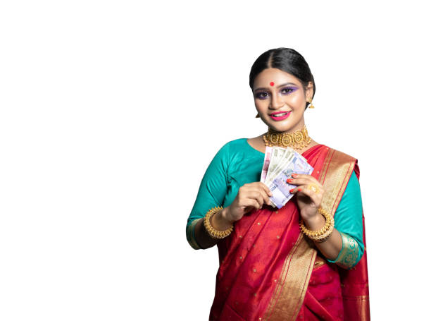 istock Happy woman holding Indian rupee notes 1270665416
