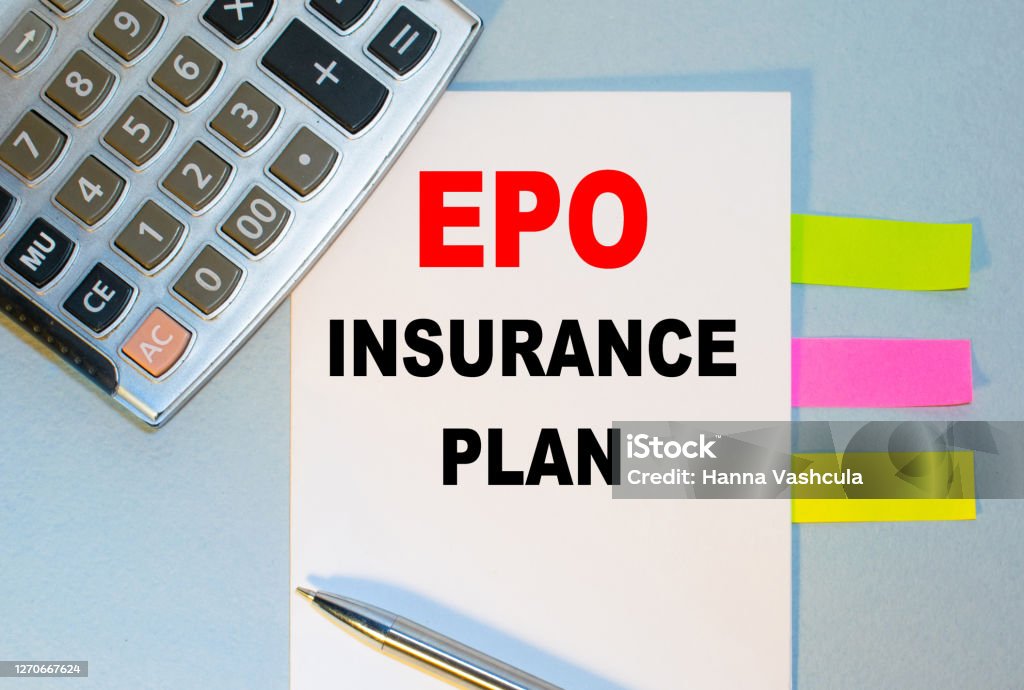 EPO INSURANCE PLAN is written on a notepad next to multicolored stickers, a calculator and a pen on a blue background. Business concept Erythropoietin Stock Photo