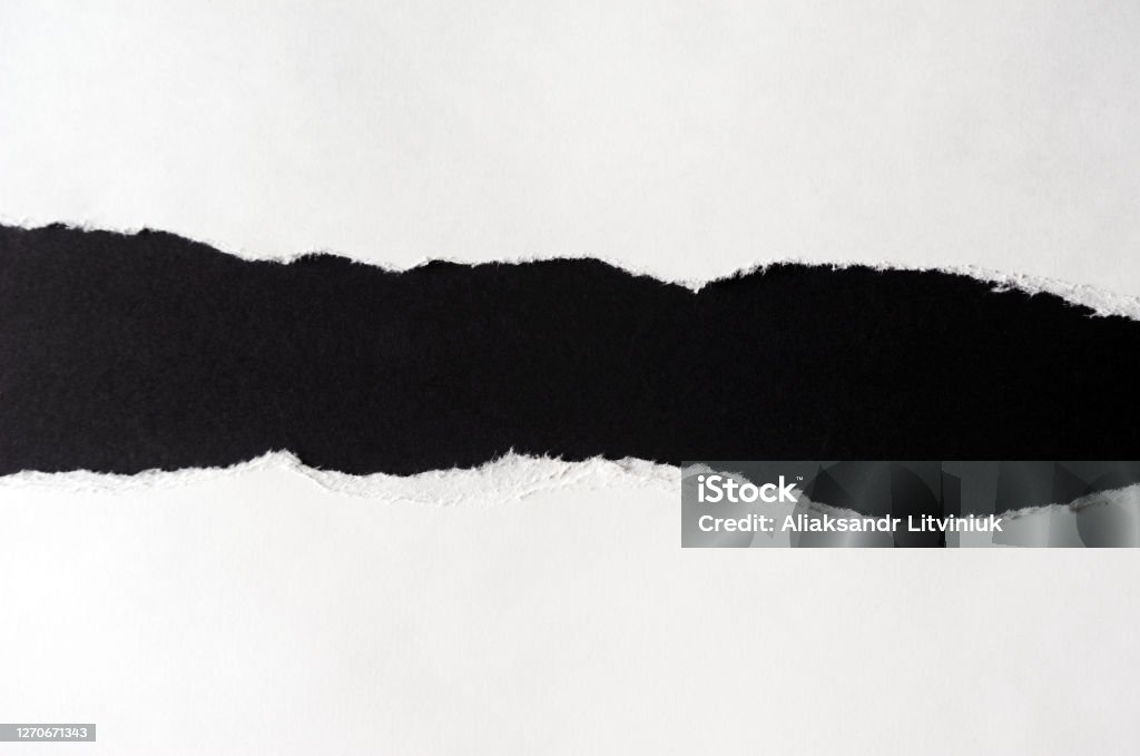 White paper with torn edges isolated with black colored paper background inside. Good paper texture Paper Stock Photo