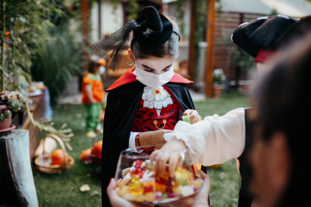 istock Little kids at a Halloween party 1270677729