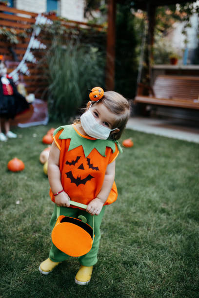 istock Little kids at a Halloween party 1270678024