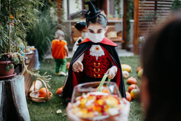 istock Little kids at a Halloween party 1270678116