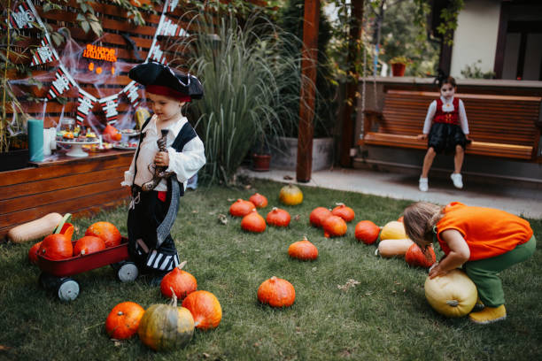istock Playful kids enjoying a Halloween party 1270679651