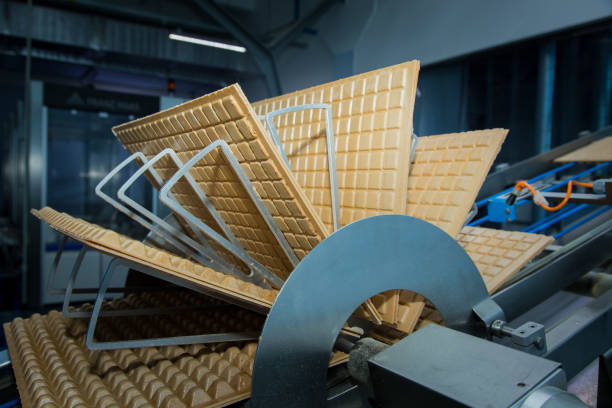 istock Sweets factory. Sweets production process. Conveyor belt with sweets on it. 1270680641