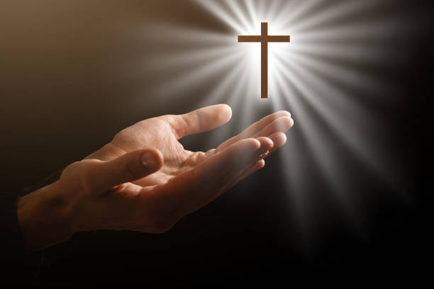 istock Light in the human hands in the dark 1270682661