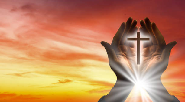 istock Light in the human hands in the dark 1270682996