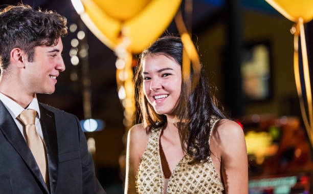 istock Teenage couple having fun at prom 1270684549