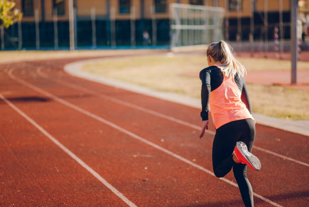 istock Female race runner on a racing track 1270684597