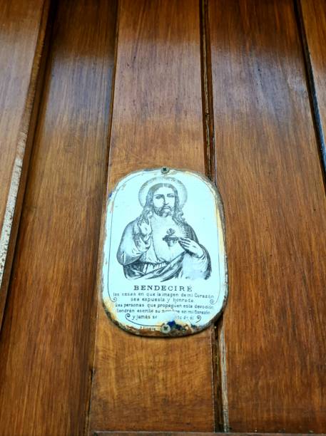 Los Cerrollos, New Mexico, USA - August 13. 2022: Decorated weathered wooden door