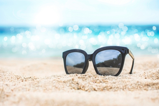 Sunglasses on Beach Bench \nSt. Thomas, US Virgin Islands