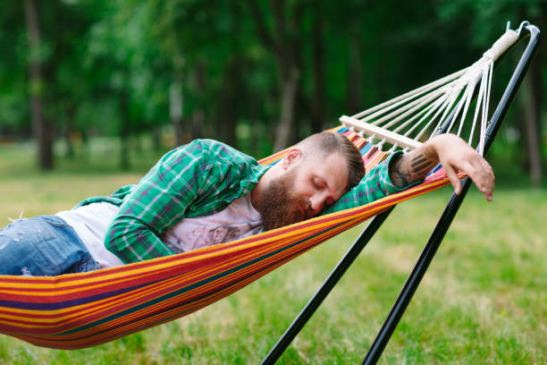 istock The man is lying on a hammock. 1270685808