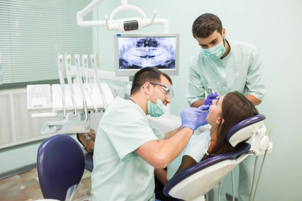istock Doctor Dentist with an assistant work in a dental clinic 1270687985