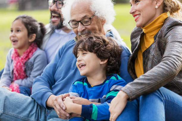 istock Three generation Hispanic family, boy laughing 1270688097