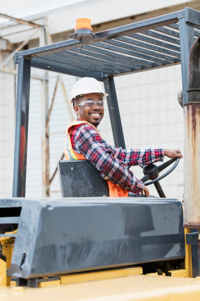 istock African-American man operating forklift 1270689153