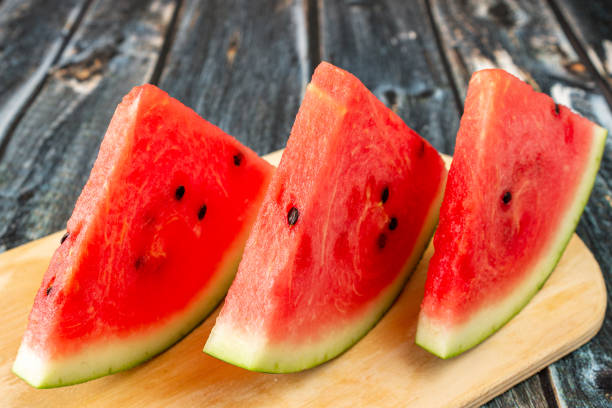 istock Red watermelon cut on a cutting board. Close-up. 1270689699