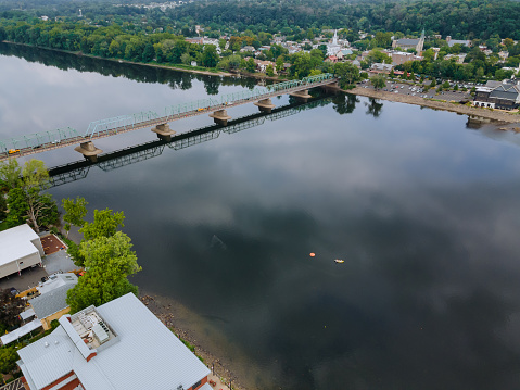 The view of aerial Delaware river, bridge across the in the historic city New Hope Pennsylvania and Lambertville New Jersey US