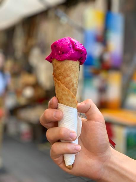 istock Pink dragon fruit ice cream in a waffle cone 1270694576